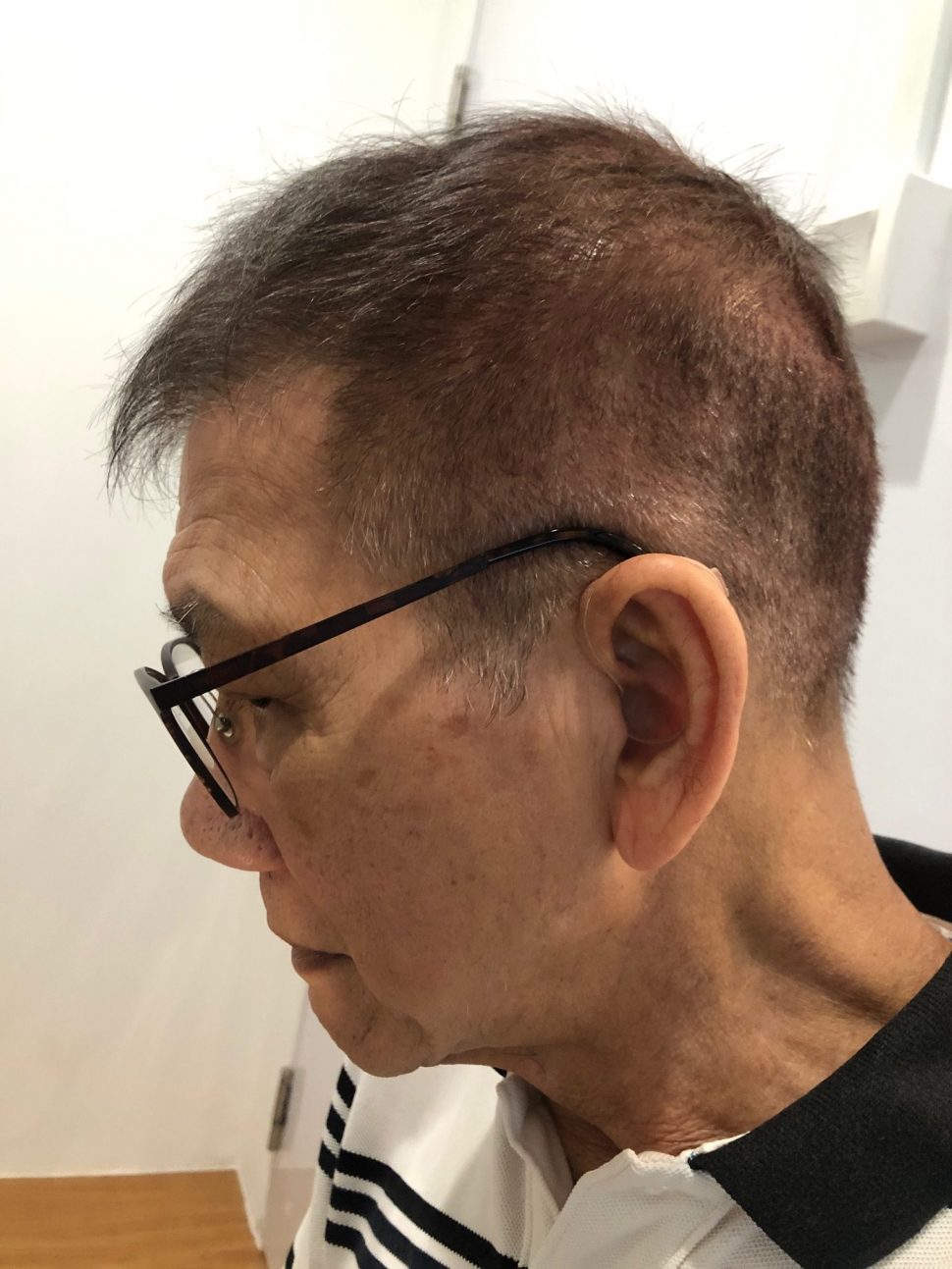 Mr Lee Customer with Quattro hearing aids